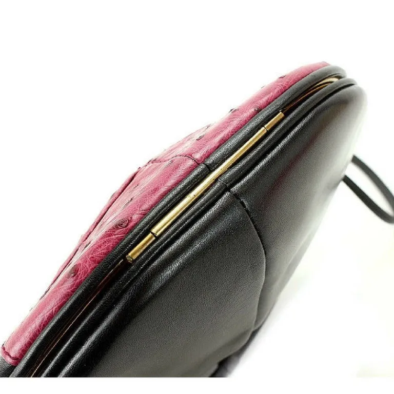 1980s. Vintage BALLY cute duck design black leather and pink ostrich leather combi round shoulder bag, clutch purse. Made in West Germany.