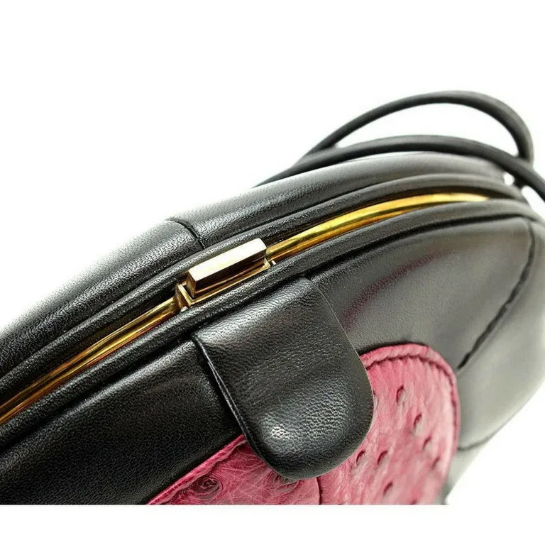 1980s. Vintage BALLY cute duck design black leather and pink ostrich leather combi round shoulder bag, clutch purse. Made in West Germany.