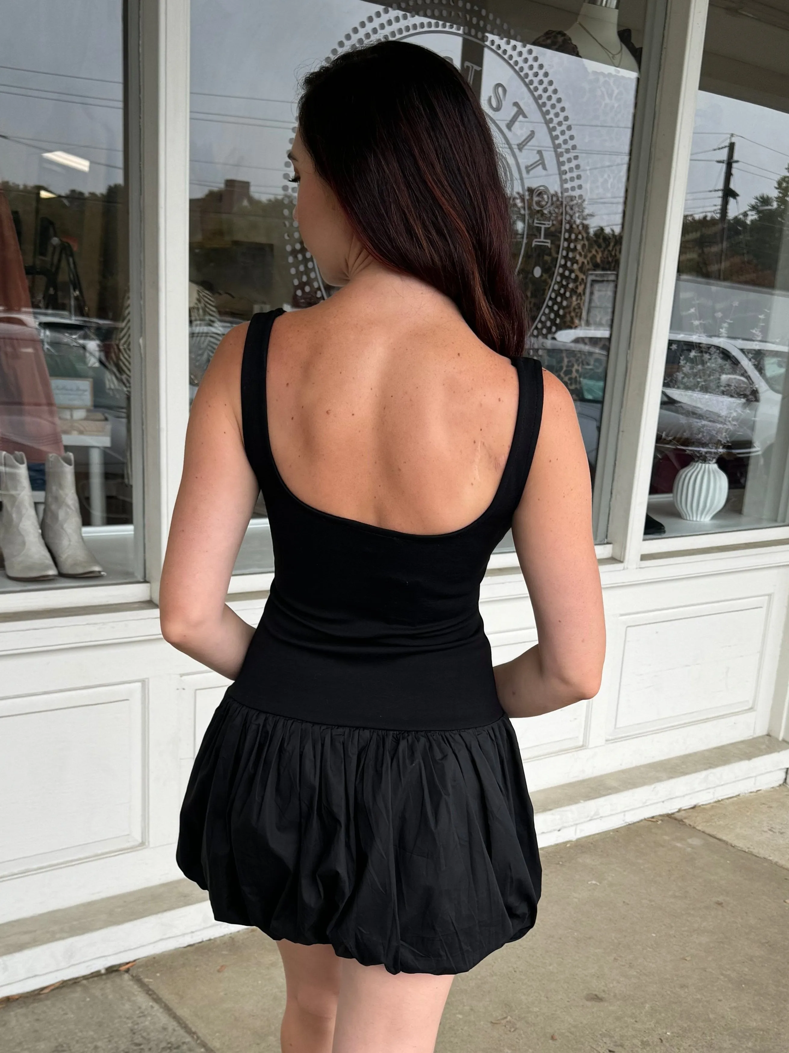 By Surprise Bubble Hem Mini Dress