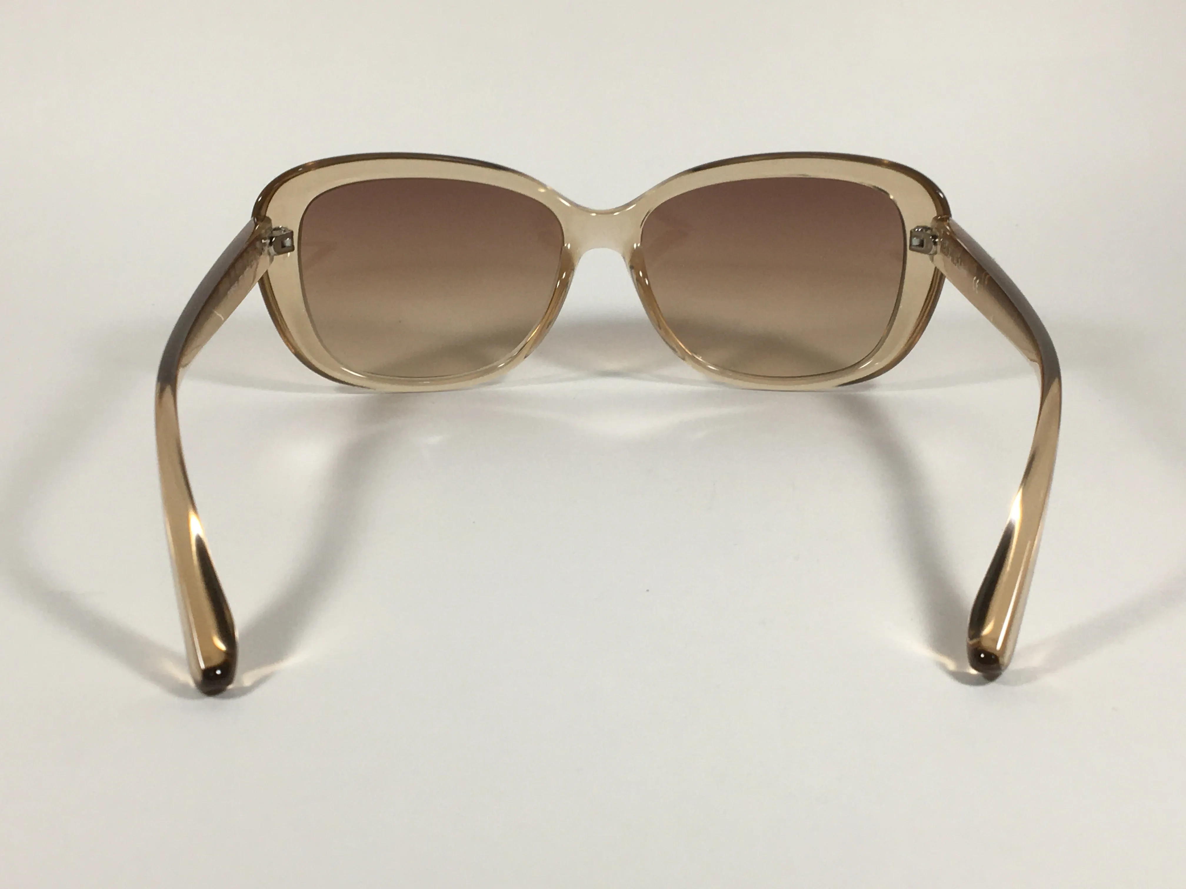 Calvin Klein Oval Sunglasses CK19541S 270 Light Brown Crystal Frame Brown Gradient Lens