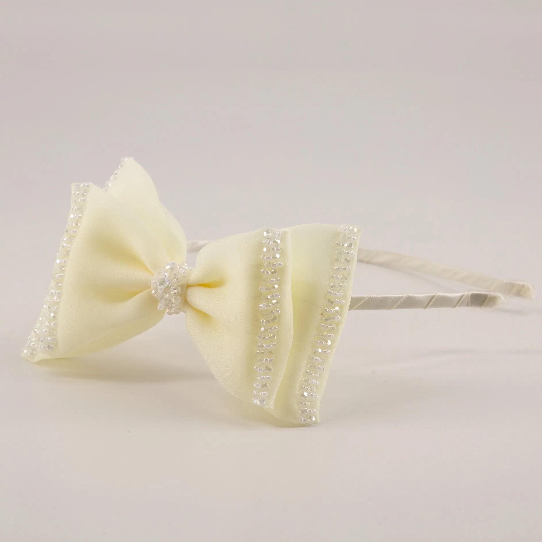 The Wonderland Designer Hair Bow Headband