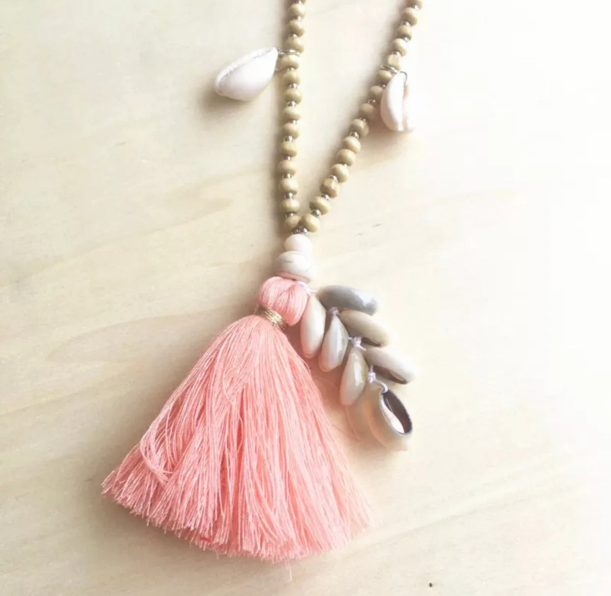 Wooden Beads Necklace with Cowry Shells and Cotton Tassels | Erika Williner Designs